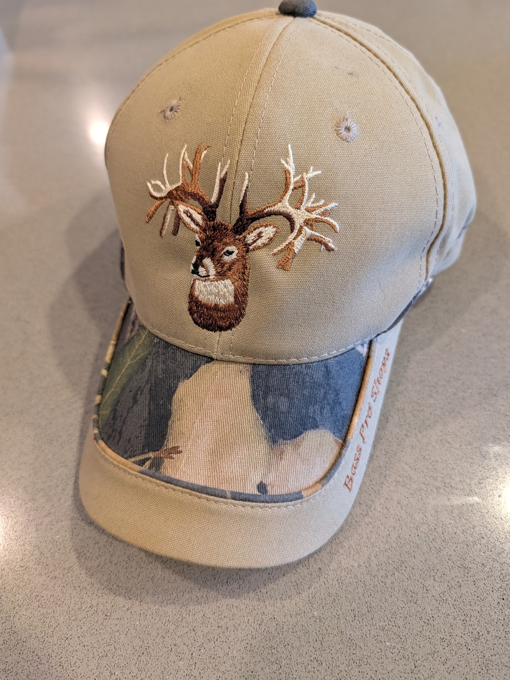Vintage Bass Pro Shops Tan Baseball Cap with Deer Embroidery and Camo Bill